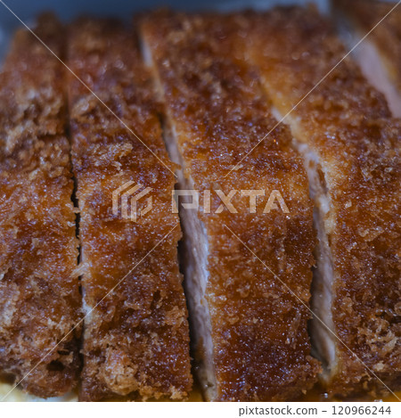A thick pork loin cutlet filling the screen 120966244