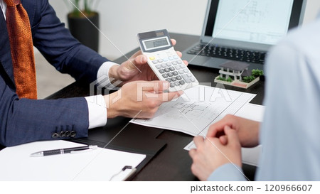 Businessman calculating real estate quote 120966607
