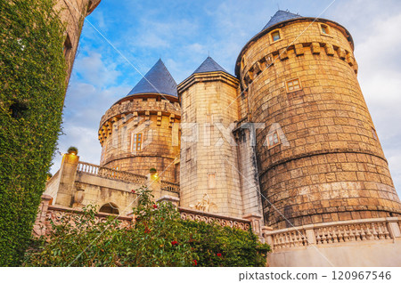 stone tower of a medieval European castle fortress 120967546