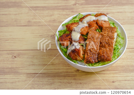 Fried chicken and pork cutlet rice bowl Fried chicken and pork cutlet rice bowl 120970654