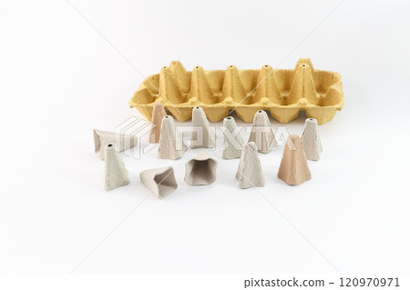 cones are arranged in a row and some are lying on their sides, The egg carton components, materials for kids craft project, step in creative process. 120970971