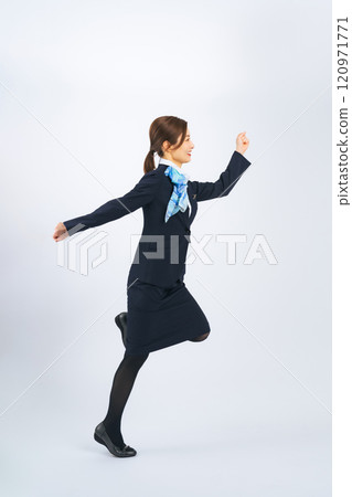 Full-body photo of a jumping service worker woman Full-body photo of a jumping service worker woman 120971771