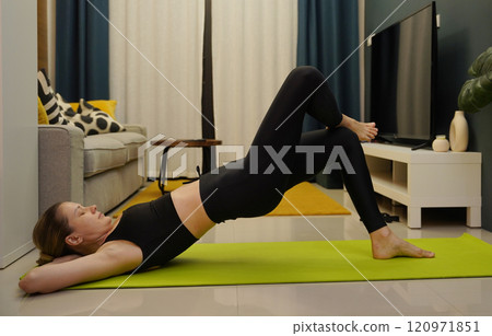 A young woman have a joyfully yoga practice  120971851