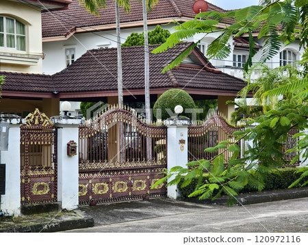 Detailed view of windows, doors and balconies of city buildings  120972116