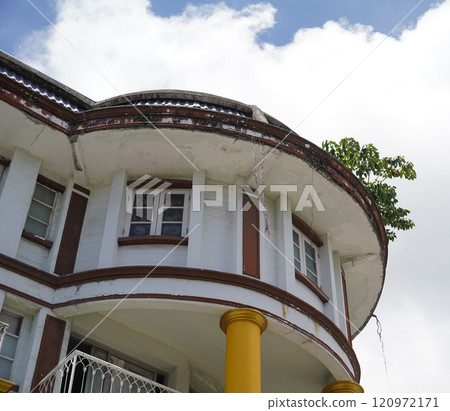 Detailed view of windows, doors and balconies of city buildings  120972171