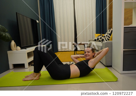 A young woman have a joyfully yoga practice  120972227