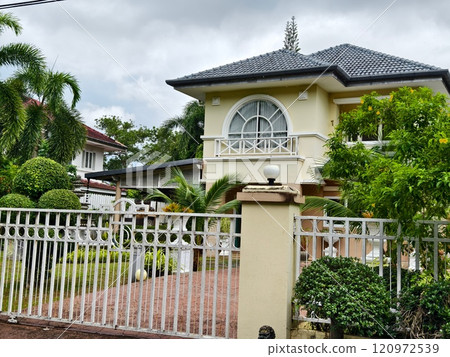 Detailed view of windows, doors and balconies of city buildings  120972539