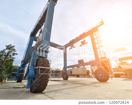 A large blue gantry crane for boats 120972614