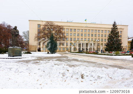 uzhhorod, ukraine - 09 jan, 2017: christmas tree on the narodna square. urban landscape. regional government administration building in the background uzhhorod, ukraine - 09 jan, 2017: christmas tree on the narodna square. urban landscape. regional government administration building in the background 120973016