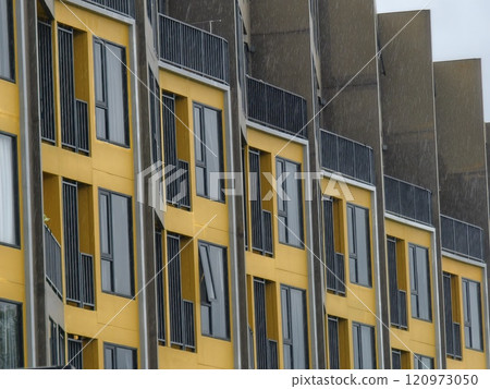 Detailed view of windows, doors and balconies of city buildings Detailed view of windows, doors and balconies of city buildings 120973050