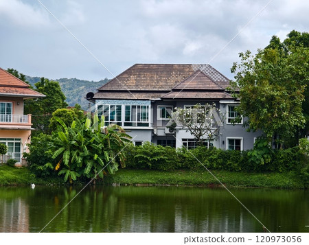 Detailed view of windows, doors and balconies of city buildings  120973056