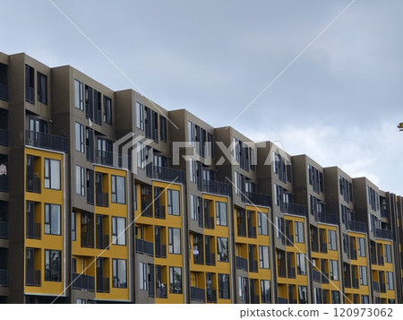 Detailed view of windows, doors and balconies of city buildings  120973062