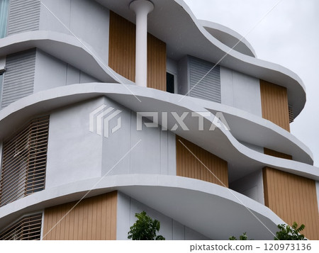 Detailed view of windows, doors and balconies of city buildings  120973136