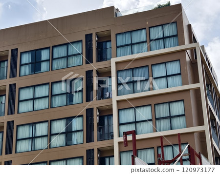 Detailed view of windows, doors and balconies of city buildings Detailed view of windows, doors and balconies of city buildings 120973177