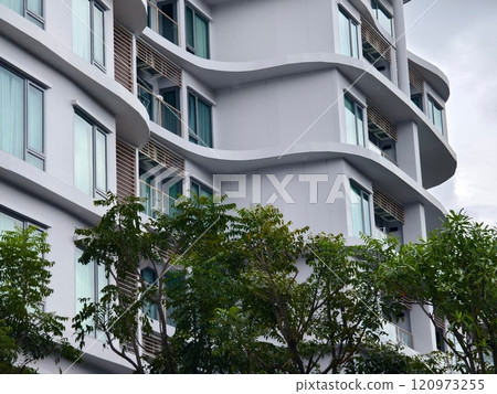 Detailed view of windows, doors and balconies of city buildings  120973255
