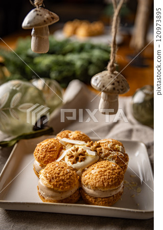 Delicious cream puffs forming flower shape Delicious cream puffs forming flower shape 120973895