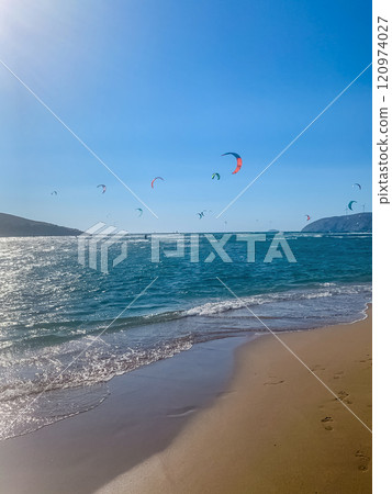 Kitesurfing adventure in clear waters on a sunny coastal day. High quality photo Kitesurfing adventure in clear waters on a sunny coastal day. High quality photo 120974027