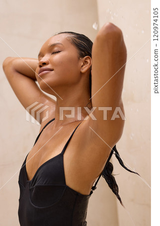 Refreshing Beauty Treatment: Woman Enjoying Water Shower Relaxation 120974105