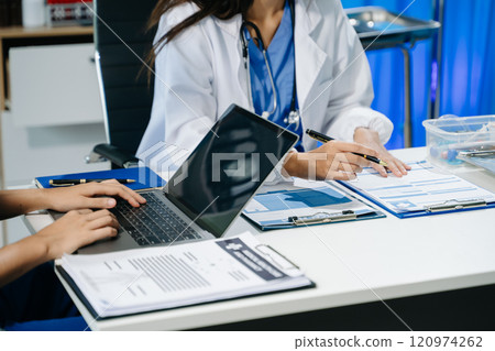Medical technology network team meeting concept. Doctor hand working with smart phone modern digital tablet and laptop Medical technology network team meeting concept. Doctor hand working with smart phone modern digital tablet and laptop 120974262