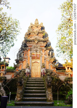 Ancient Pagoda of Portal von Taman Saraswati temple in Ubud city landmark on Bali Island of Indonesia. Travel destination for culture of Asian 120974337