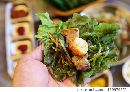 Korean barbecue food. Lettuce , Sesame leaf and meat wrap Korean barbecue food. Lettuce , Sesame leaf and meat wrap 120974851