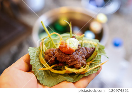 Korean barbecue food. Lettuce , Sesame leaf and meat wrap Korean barbecue food. Lettuce , Sesame leaf and meat wrap 120974861