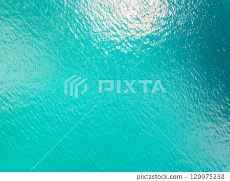 Sea surface aerial view,Bird eye view photo of small waves texture water surface turquoise sea background,Beautiful sea nature, Amazing view waves background 120975288