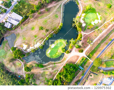 aerial view drone shot of beautiful golf field 120975302