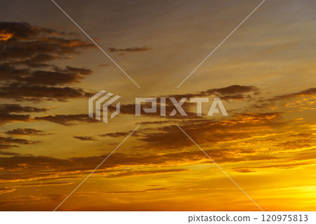 Sunset: Clouds shining in the setting sun Sunset: Clouds shining in the setting sun 120975813