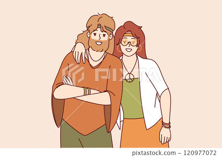 Hippie man and woman stand in embrace and smile, rejoicing at presence of free youth subculture 120977072