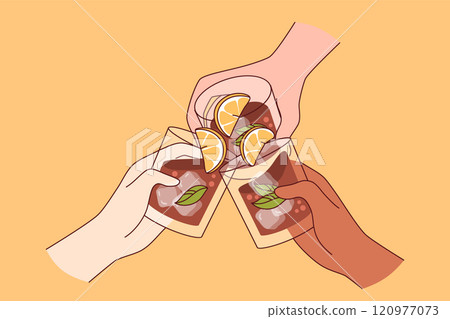 Alcoholic drink in glasses in hands of people drinking whiskey with pieces of lime and ice cubes Alcoholic drink in glasses in hands of people drinking whiskey with pieces of lime and ice cubes 120977073