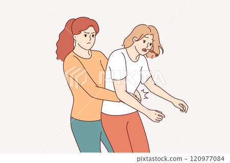 Heimlich technique is demonstrated by woman saving friend who was choking and pressing on stomach Heimlich technique is demonstrated by woman saving friend who was choking and pressing on stomach 120977084