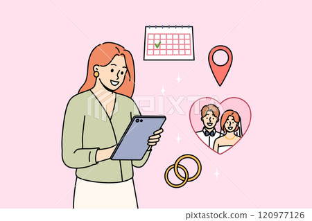 Happy woman is preparing for wedding, choosing date on calendar and ordering wedding rings in tablet 120977126