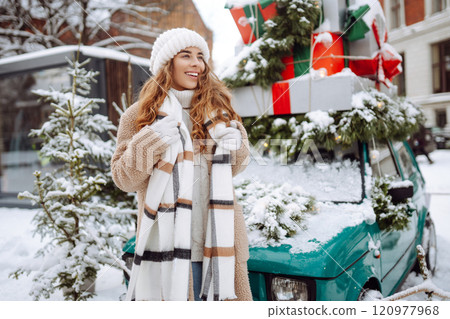Happy woman drinking hot drink and taking selfie on winter snowy day. Weekend concept. Happy woman drinking hot drink and taking selfie on winter snowy day. Weekend concept. 120977968