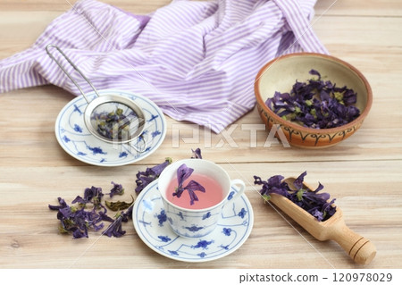 A cup of herbal tea from dried flowers of Wild mallow, lat.  Malva sylvestris. 120978029