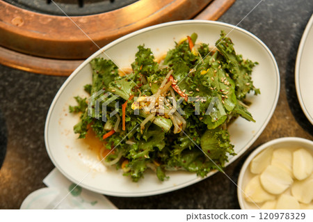 lettuce salad seasoned with soy sauce. Korea food lettuce salad seasoned with soy sauce. Korea food 120978329