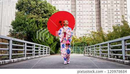 City, umbrella and Japanese woman with fashion, sightseeing and travel on urban bridge. Street, kimono and parasol with walking, outdoor and journey with smile, style and traditional Asian dress City, umbrella and Japanese woman with fashion, sightseeing and travel on urban bridge. Street, kimono and parasol with walking, outdoor and journey with smile, style and traditional Asian dress 120978684