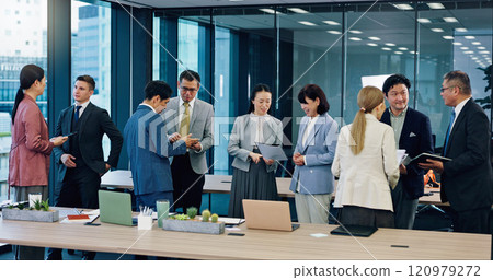 Japan, networking and business people in office, conversation or planning for onboarding. Employees, seminar or clients for international trade, collaboration or negotiation for development or growth 120979272