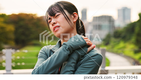 Outdoor, woman and fitness with neck pain from workout strain with muscle ache and injury in Japan. Female person, exercise and active with inflammation or sore for self care, health and wellbeing Outdoor, woman and fitness with neck pain from workout strain with muscle ache and injury in Japan. Female person, exercise and active with inflammation or sore for self care, health and wellbeing 120979348
