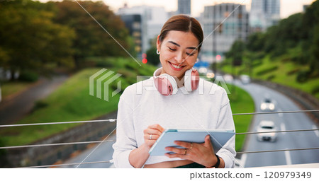 Smile, woman and writing on tablet in city for graphic design, digital illustration and creative process. Female artist, headphones and drawing for website, editing update and project on Japan bridge Smile, woman and writing on tablet in city for graphic design, digital illustration and creative process. Female artist, headphones and drawing for website, editing update and project on Japan bridge 120979349