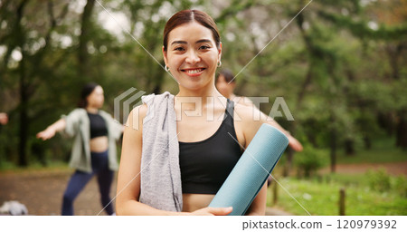 Park, woman and smile on portrait for yoga session with mat for health, self care and wellbeing in Japan. Female person, outdoor and happy or satisfied in confidence for fitness, workout and exercise 120979392