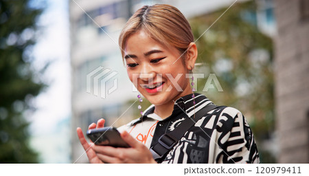Japanese, woman and city with mobile for social media, online communication and search location. Outdoor, female person and traveler with smartphone for application, travel or map navigation in Tokyo 120979411