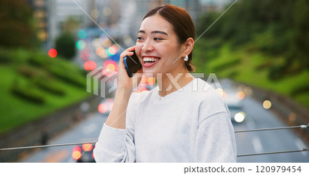 City, laughing and phone call of Japanese woman outdoor for communication on bridge with traffic on street. Conversation, commute and funny with happy tourist person in Japan for travel or trip 120979454