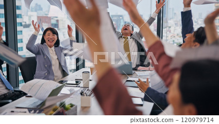 Business people, paper throw and office cheer with success, opportunity and victory in meeting. Japan, boardroom and wow with teamwork, collaboration and win with paperwork in air with excited staff 120979714