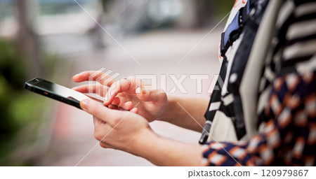 Person, hands or browsing with phone in city for travel, destination or location app in an urban town. Closeup, Japan or user scrolling on mobile smartphone for tourism, social media or communication 120979867