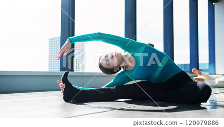 Dancer, fitness and stretching legs for health, start and prepare for performance in studio. Warm up, flexibility and Japanese woman exercise body, hamstring muscle and practice on floor in class Dancer, fitness and stretching legs for health, start and prepare for performance in studio. Warm up, flexibility and Japanese woman exercise body, hamstring muscle and practice on floor in class 120979886