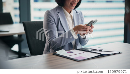 Phone, document and businesswoman in office with report for email with client communication. Paperwork, cellphone and financial planner with contact for online investment profit or revenue in Japan 120979971