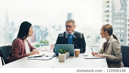 Japan, laptop and business people in meeting, teamwork and conversation with connection. Employees, global traders and group in office, computer and feedback for progress, planning and cooperation 120980186