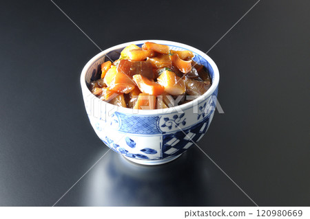 A luxurious, heaping bowl of pickled seafood photographed against a black background A luxurious, heaping bowl of pickled seafood photographed against a black background 120980669