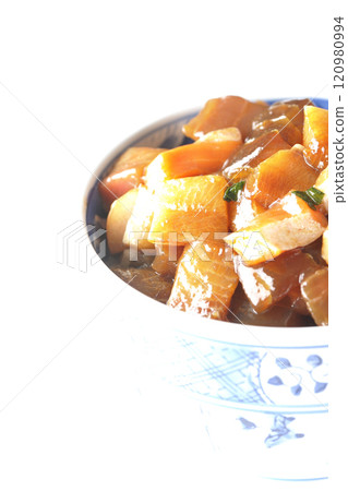 A luxurious, heaping bowl of pickled seafood with plenty of ingredients photographed on a white background 120980994